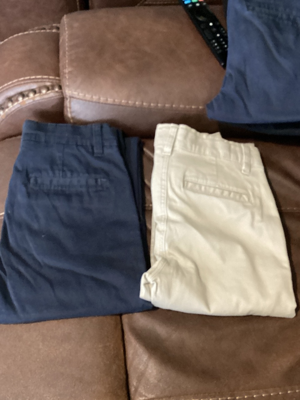 Izod Boys' Chino Pants in Navy and Khaki. Size 12 slim, ($7 each)